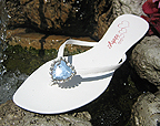 White comfortable flip flops with Rhinestone Hear.  Great for Brides.